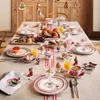 A beautifully set table for a festive breakfast, featuring Villeroy & Boch Winter Bakery Delight tableware, croissants, pancakes, fruit, and coffee. Náhled obrázku produktu