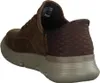 A rear view of a brown sneaker. Voir les images du produit