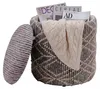 Sitzhocker Boho mit Stauraum in Grau, Gesamtansicht mit geöffnetem Deckel und Inhalt.