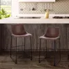 Two brown bar stools with black metal legs are placed in a modern kitchen setting. Produktbild-Vorschau