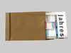 A brown envelope partially revealing a folded calendar poster. Produktbild-Vorschau