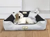 A golden retriever puppy lies comfortably in a large, plush dog bed with black and white accents. Náhled obrázku produktu