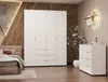 A bedroom scene featuring a large white wardrobe and a white chest of drawers. Náhľad obrázku produktu