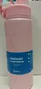 A pink stainless steel water bottle with a blue label. Voir les images du produit
