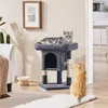 Two cats interacting with a cat tree in a living room setting. Produktbild-Vorschau