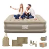A family is taking a selfie on an inflatable mattress, with accessories laid out below. Produktbild-Vorschau