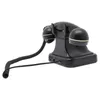 A black retro rotary dial telephone is shown from a side angle against a white background. Podgląd zdjęcia produktu