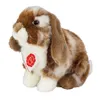 A stuffed toy rabbit is shown sitting against a white background. Anteprima dell’immagine prodotto