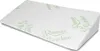 A wedge-shaped pillow with a white cover and green text. Náhled obrázku produktu