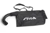 A black leaf blower collection bag with a curved black tube attached, and a black shoulder strap. Produktbild-Vorschau