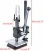 A manual stamping machine with measurement markings. Voir les images du produit