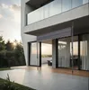 A modern house with a patio and a retractable awning. Produktbild-Vorschau