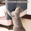 A cat is scratching a sofa, with text overlay indicating protection. Produktbild-Vorschau