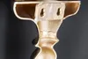 A close-up view of the back of a decorative wall console shelf, showing its mounting holes and ornate design. Produktbild-Vorschau