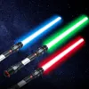 Three lightsabers with blue, green, and red blades are displayed against a starry night background. Produktbild-Vorschau