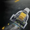 A vacuum cleaner attachment cleaning up debris. Voir les images du produit