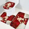 A Christmas-themed toilet seat cover and bath mat set featuring Santa Claus. Náhľad obrázku produktu