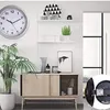 A modern living room setting with a clock, a cabinet, and a plant. Voir les images du produit