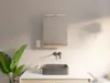 A modern bathroom vanity with a sink and mirror. Náhled obrázku produktu