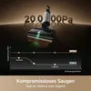A vacuum cleaner head is shown cleaning up dirt and liquid, with a graph illustrating suction power in different positions. Produktbild-Vorschau