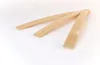 Three wooden slats are arranged in a fanned-out pattern on a white background. Produktbild-Vorschau