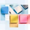 A collage of different colored phone stands, some on a desk with office supplies. Voir les images du produit