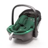 A green and gray infant car seat is shown against a white background. Náhled obrázku produktu