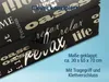 A close-up of a folded mattress with text and patterns on its surface. Produktbild-Vorschau