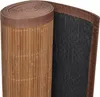 A rolled-up bamboo rug with a brown fabric border and a black non-slip backing. Náhled obrázku produktu