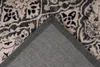 A close-up view of a rug's corner, showing the texture and pattern of the rug. Produktbild-Vorschau