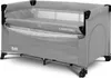 A gray travel crib with a mattress inside, shown from a side angle. Anteprima dell’immagine prodotto