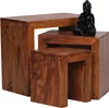 A set of three wooden nesting tables of varying sizes, with a small black Buddha statue placed on the middle table. Voir les images du produit