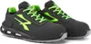 A pair of black and green athletic shoes on a white background. Voir les images du produit
