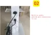 A close-up of a white trolley with multiple electrical sockets built into its side, with a black power cord plugged into one of them. A yellow square with the number '02' is in the top right corner, and text describing the feature is to the right of the tr Náhled obrázku produktu