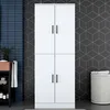 A tall, white cabinet with four doors stands in a modern bathroom setting. Produktbild-Vorschau