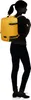 A silhouette of a person wearing a yellow backpack. Produktbild-Vorschau