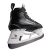 A black Bauer ice skate is shown from a side-angle, isolated on a white background. Podgląd zdjęcia produktu
