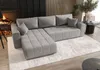 A modern living room with a fireplace, wooden wall paneling, and a large sectional sofa. Produktbild-Vorschau