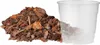 A pile of orchid soil next to a clear plastic pot. Anteprima dell’immagine prodotto