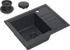 A black granite kitchen sink with accessories shown next to it, on a white background.