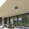 An outdoor patio with modern furniture and large glass sliding doors. Náhľad obrázku produktu