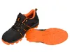 A pair of black and orange athletic shoes, with one shoe standing and the other lying on its sole. Produktbild-Vorschau