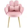 A pink velvet chair with a bow-shaped pillow and gold legs, isolated on a white background. Náhľad obrázku produktu