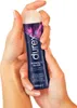 Hands holding a bottle of Durex Perfect Glide lubricant. Podgląd zdjęcia produktu