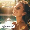 A woman is smiling and enjoying herself in a pool on a sunny day. Produktbild-Vorschau