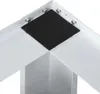 Close-up view of a white metal corner joint with a black rubber pad attached by bolts. Produktbild-Vorschau