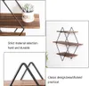 Collage of images showing a wooden and metal wall shelf with close-ups and descriptive text. Produktbild-Vorschau