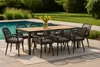 An outdoor dining set with a table and eight chairs is placed on a patio next to a swimming pool. Produktbild-Vorschau