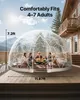 A group of people are enjoying a meal inside a clear geodesic dome tent set up on a wooden deck, with a house and mountains in the background. Anteprima dell’immagine prodotto