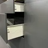 Close-up view of kitchen drawers, showing the interior and drawer slides. Produktbild-Vorschau